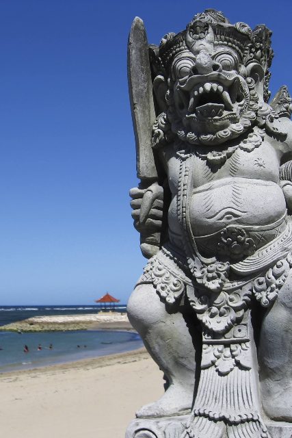stone statue beach ceremony